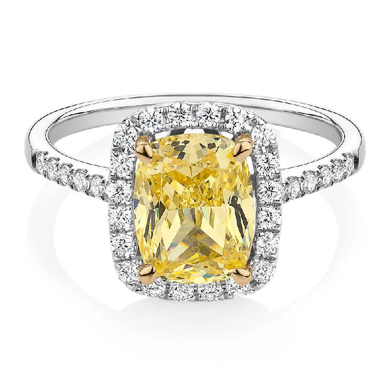 Cushion Radiant and Round Brilliant halo engagement ring with 2.94 carats* of diamond simulants in 10 carat white and yellow gold